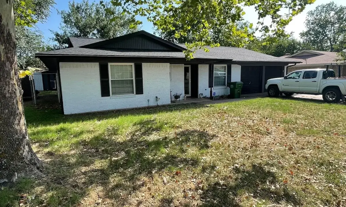 Professional roofing crew working on a residential roof in West Haven-Sylvan